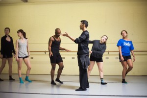 Perez talks the dancers through the beginning of the piece.