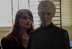 Jessica Cline poses with Draco Malfoy cut out. Photo by Kyleigh Carter