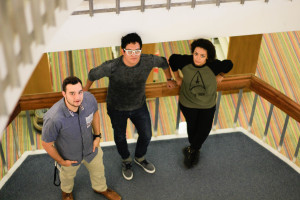 Rufino Medrano, Caleb Ortega and Ronnie Garcia gather in the new stairwell of their new design space.