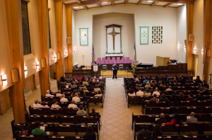 John Church speaks before his senior show at St. John's United Methodist Church. Photo by Christy Marshall