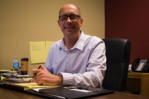 Business program Chairman, Brad Bergsbaken sits in his office in the welcome center. Photo by Christy Marshall 