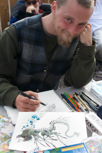 Self-taught artist Bobby Marney working on new drawings. Image by Whitney Wernick