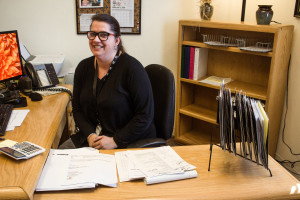 Financial Aid Counselor Anita Keim poses for Jackalope magazine while in her office in Mouton Hall. 