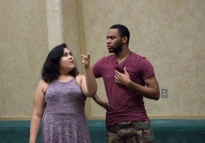 Improv Club President Lani Dekker and member Hermann Hopson play a game of Freeze. Photo by Kyleigh Carter. 