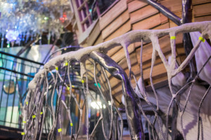 A Meow Wolf crafted guardrail imitates the branches of a tree. Photo by Richard Sweeting