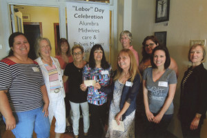 Santa Fe NOW presents a donation to the Alumbra Midwives of Las Vegas, NM. Photo provided by Santa Fe NOW