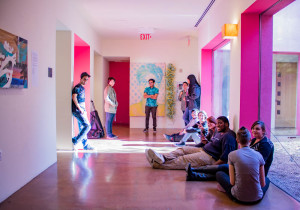 Santa Fe University of Art and Design Freshman Art Studio students wait for their art critiques in the hallway of the Thaw Art History Center. Photo credit: Chris Dorantes
