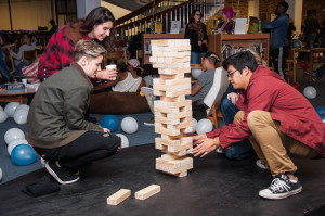 Students enjoying a game of Jenga while they watch the presidential election. Photo by Sasha Hill