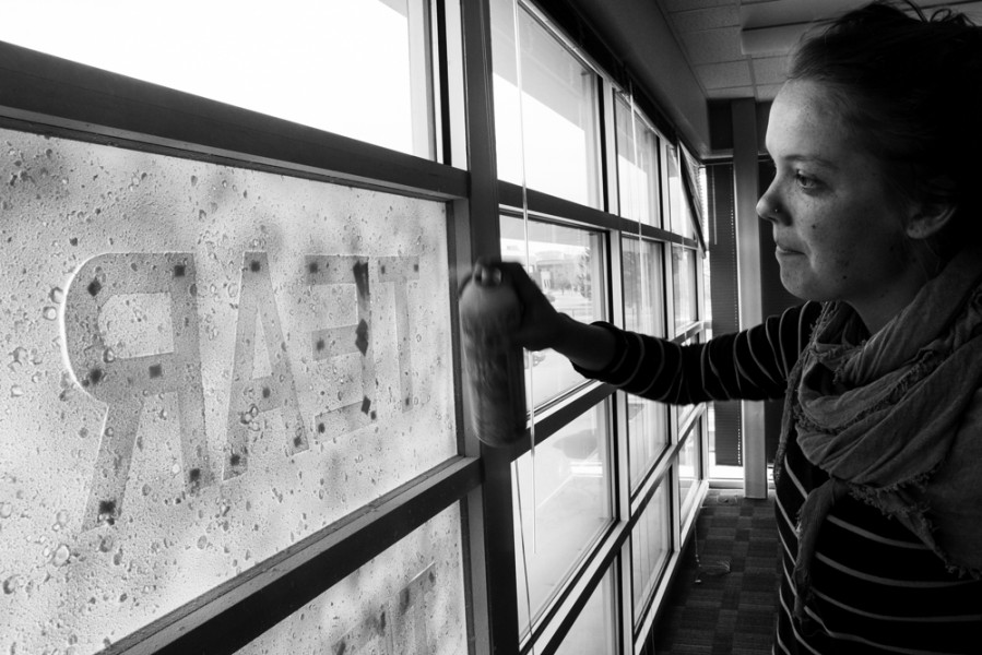 Arianna Sullivan performs a few touch-ups to the Snow Poem. 