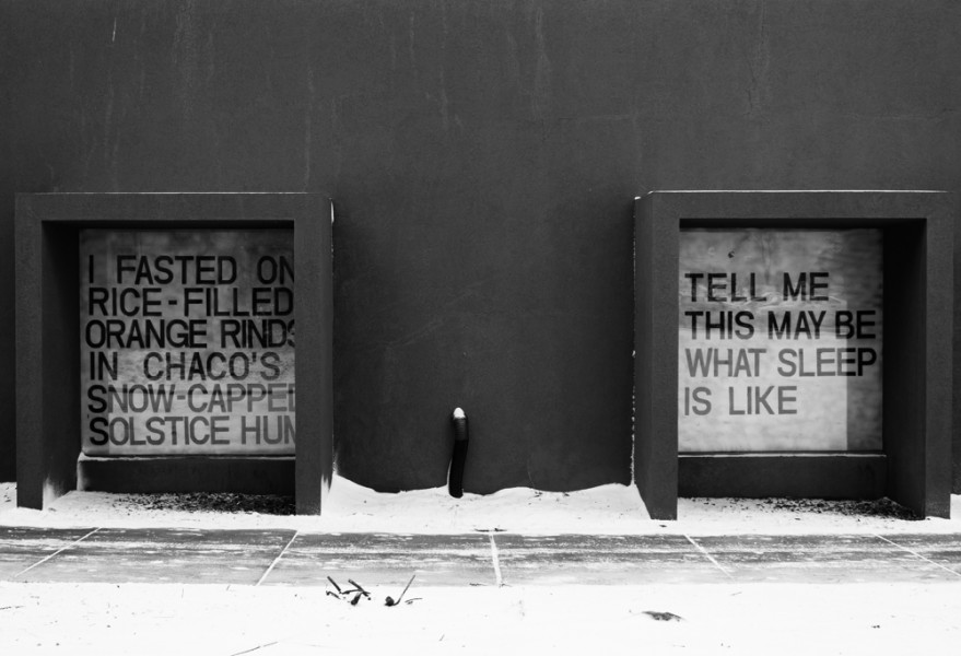 “I Fasted On Rice-Filled Orange Rinds In Chaco’s Snow Capped Solstice Hum”, “Tell Me This May Be What Sleep Is Like”. Snow Poem displayed on the side of the Thaw Fine Arts building. 
