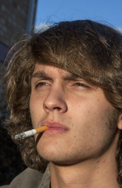 Tyler Sherek smoking a ciggerette, contemplating which dream he wants to explain next.