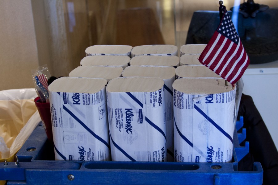 Patriotic tissue papers rests on a janitor’s cart.