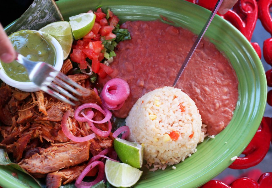 “Cochinita Pibil” is a dish that originated in the Yucatán. It consists of pork marinated in a citric juice that’s cooked inside a  banana leaf. This is eaten in special occasions, as it is hard to prepare. 