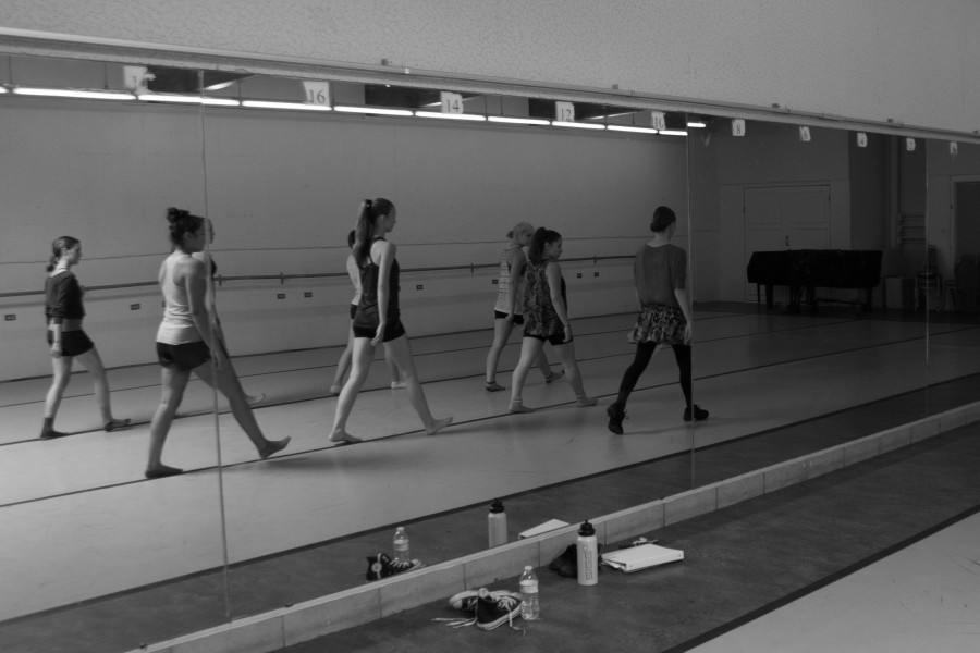 The girls follows Shannon Elliott step for step as she teaches them new choreography.