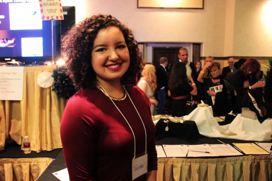 Victoria Dailey, a creative writing student at SFUAD, was one of the volunteers at the auction. 