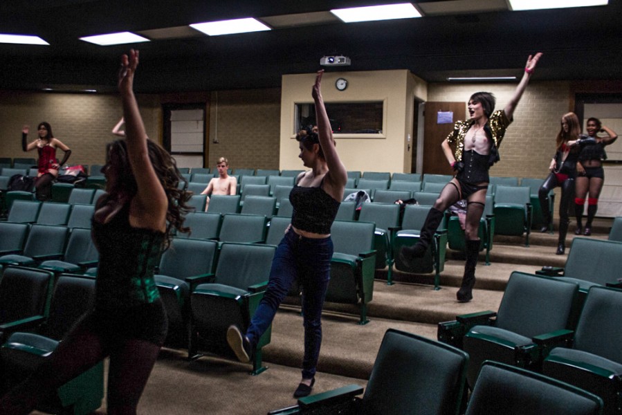 Members of the cast dance through the aisles of The Forum, the group’s temporary rehearsal space.