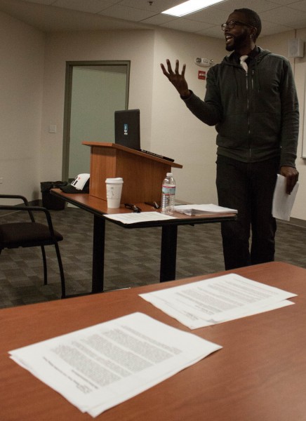 Bellamy discusses the overlap between nonfiction and poetry during a workshop held for students.
Photo by Tim Kassiotis