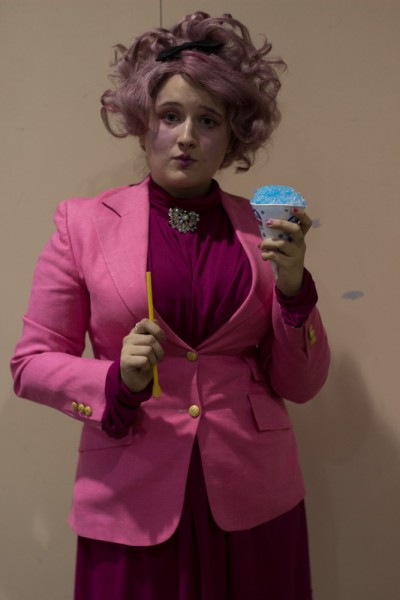 Rochelle Esquerra takes a break from her role as Effie Trinket to enjoy a snow cone. Photo by Amanda Tyler