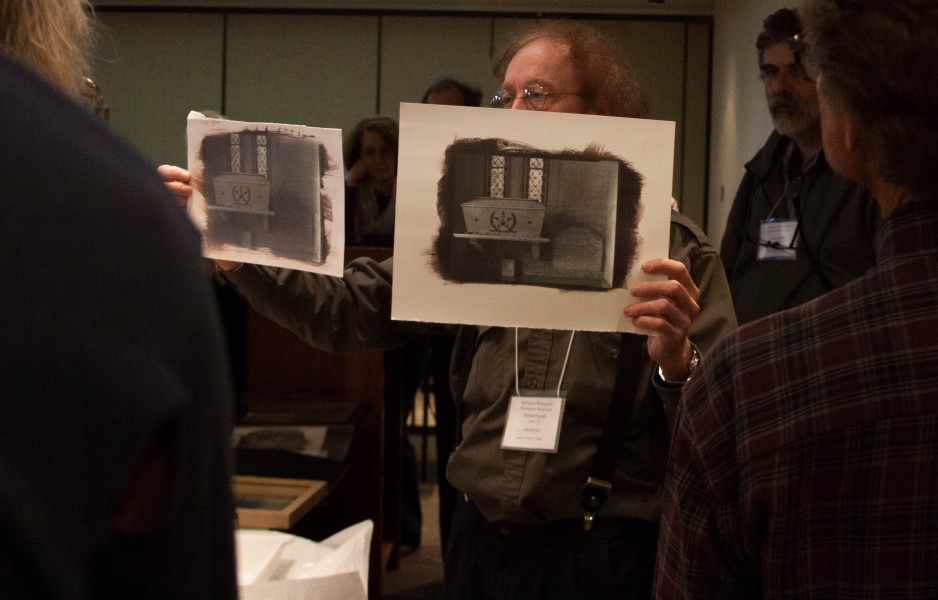 Richard Puckett shows off his final prints.
