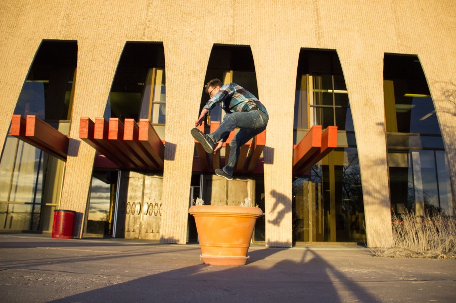 Stahlein practicing parkour outside Fogelson Library.