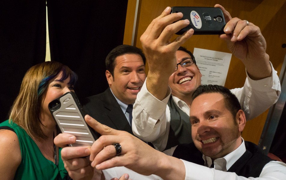 Newly elected Santa Fe Mayor Javier Gonzalez (center) is “selfie” friendly. Photo by Luke Montavon
