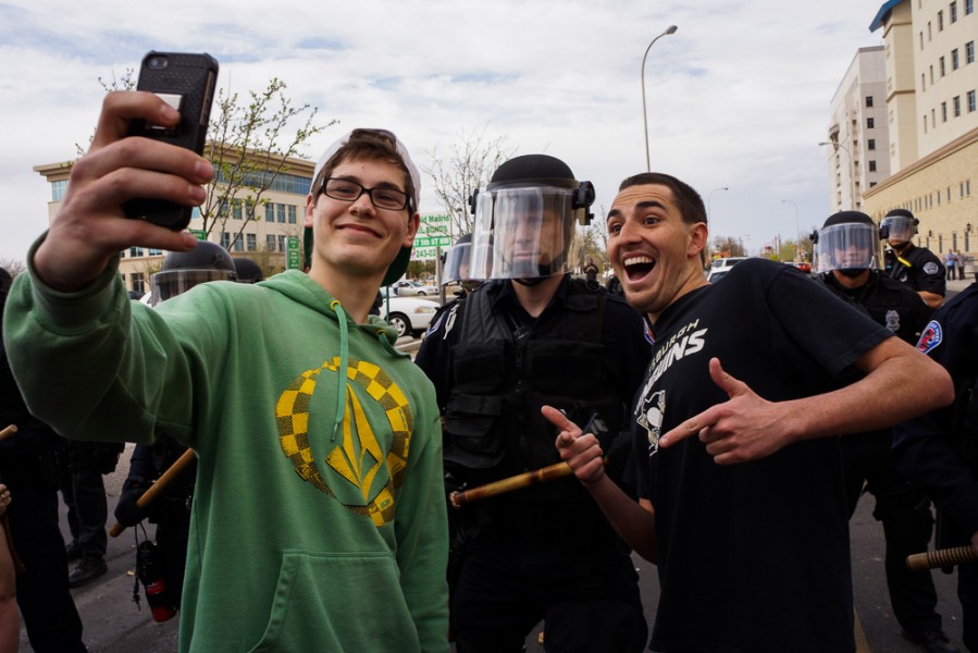 March 30 protests in downtown Albuquerque for some were perfect “selfie” opportunities. Photo by Luke Montavon 