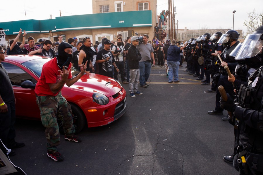 March 30 protests went from peaceful to angry as police geared to quell the crowds. Photo by Luke Montavon 