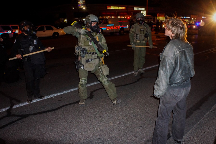 APD was joined by county and state SWAT units in an effort to control demonstrations March 30. Photo by Luke Montavon 