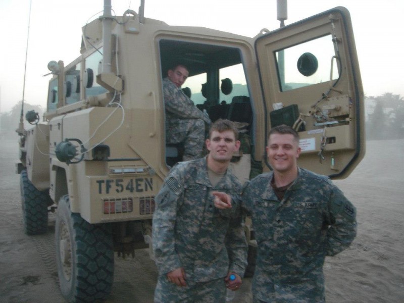 Brandon Birkey (on right) while he was still touring Iraq.