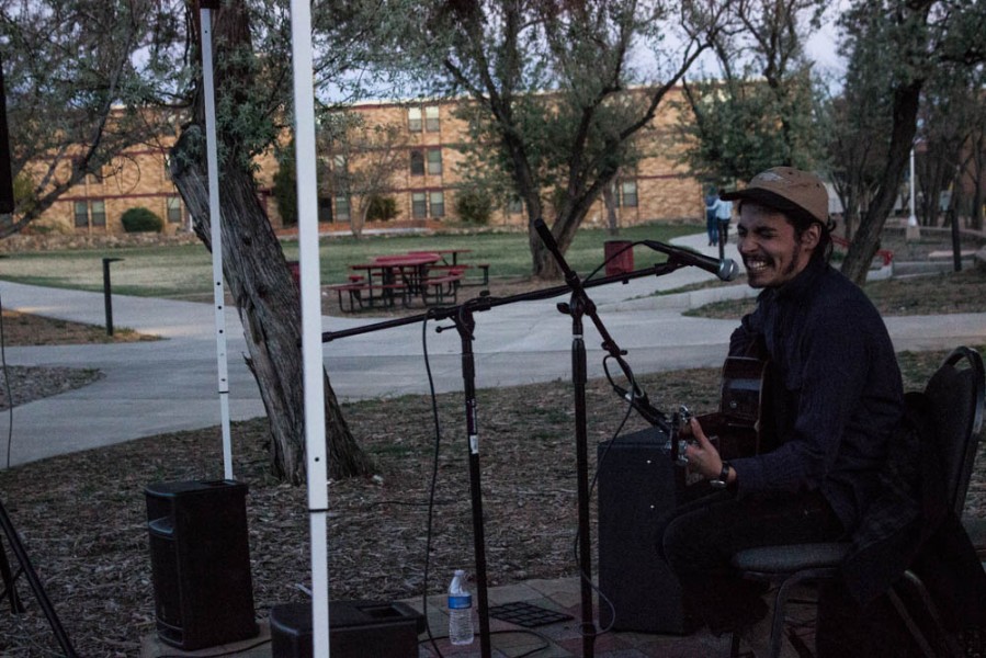 Joel Ortega gets up to perform on the side stage and share the music he’s been writing.