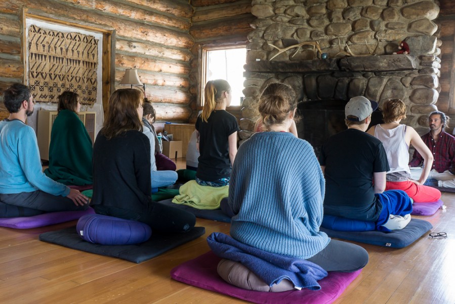 Students of the Artful Awareness course get comfortable for meditation practice. Photo by Luke Montavon 