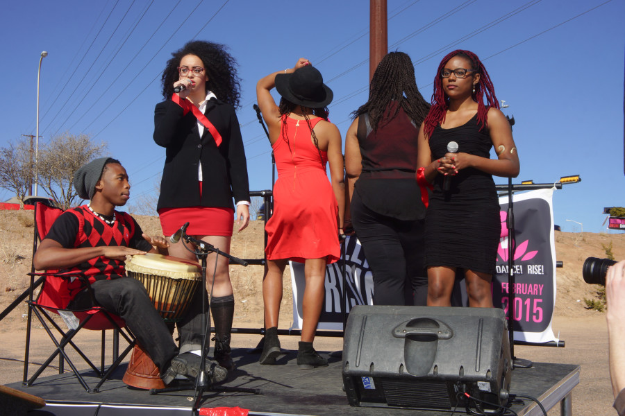 Lefr, Janel Blanco Jean-Bart of ‘For Colored Girls’ sings to show support and promote their upcoming show during 1 Billion Rising at the Santa Fe Place Mall  on Feb. 14, 2015. Luke E. Montavon/The Jackalope