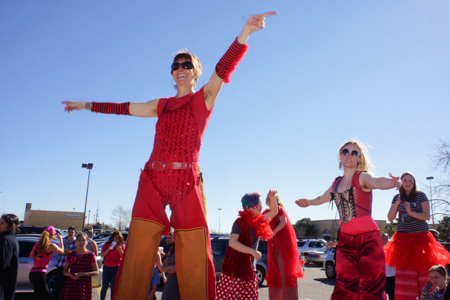 Right, Amy Cristian of Wisfool New Mexico leads other stilted dancers during the 1 Billion Rising dance at the Santa Fe Place Mall  on Feb. 14, 2015. Luke E. Montavon/The Jackalope