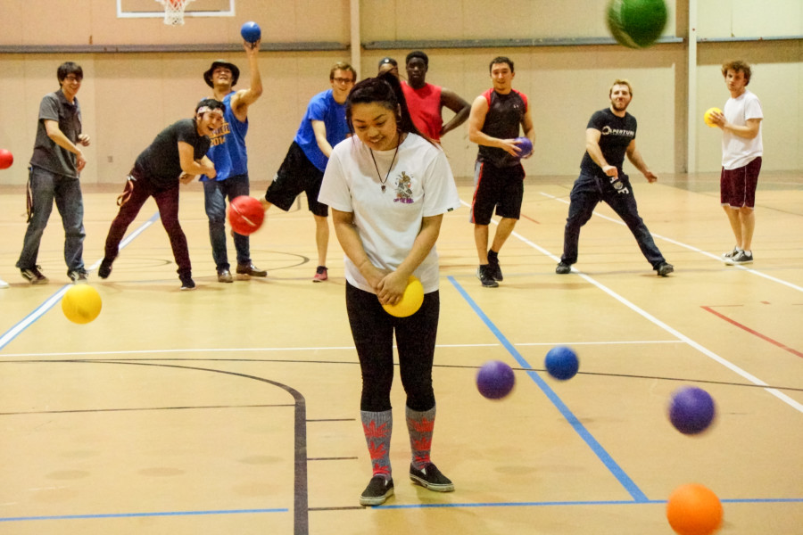 Center, Nicole Sonobe, was the last man standing during a dodgeball game on Feb 25, 2015. Photo by Luke E. Montavon/The Jackalope