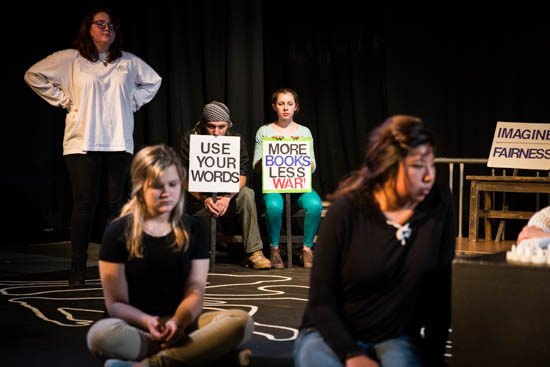 Students during a powerful rehearsal of the SFUAD production, “Borders: Crossing the Line”.  Photo by Jessie Leigh