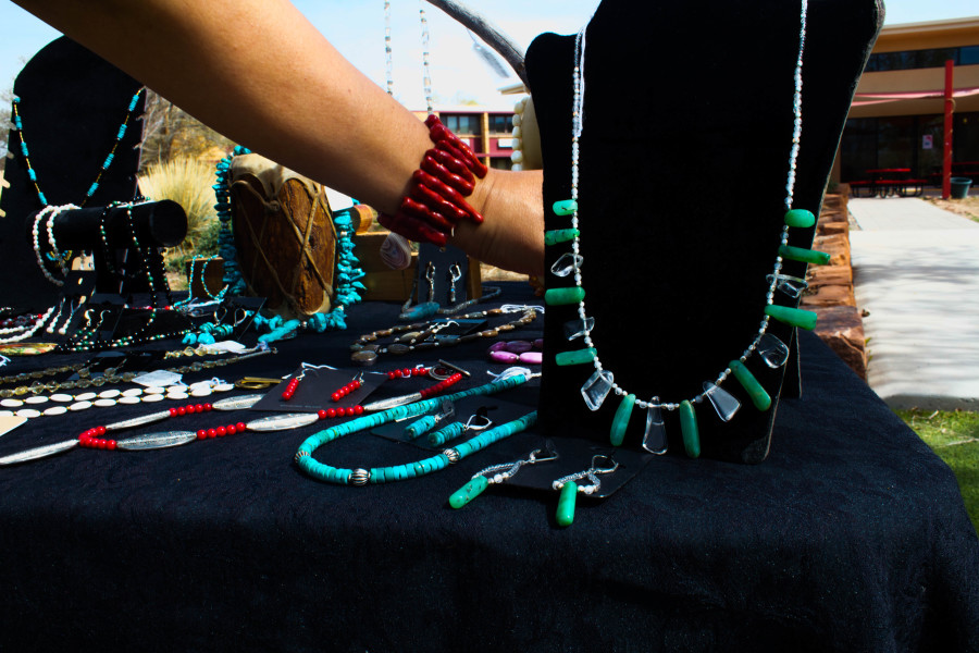 Traditional turquoise and a chili bracelet express the mix of New Mexican culture. Photo by Charlotte Martinez