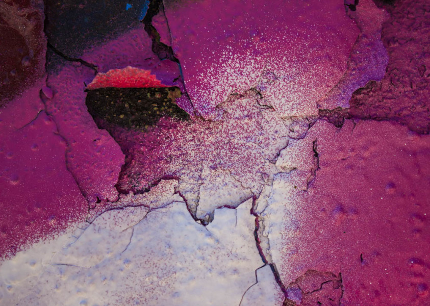 Detail shot of layers of spray paint. Photo by Kyleigh Carter.