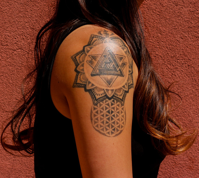 Nicole Sonobe, a Digital Arts major, shows off her self-designed tattoo of an mandala. Photo by Cydnie Smith-McCarthy