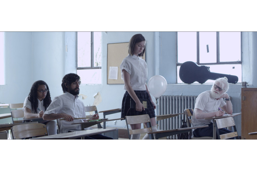 A still from the Music Box music video. Pictured from left to right: Janel Blanco, Julian Pena, Brittany Kriechbaumer, and Donald Pena. Image courtesy of Amy West.