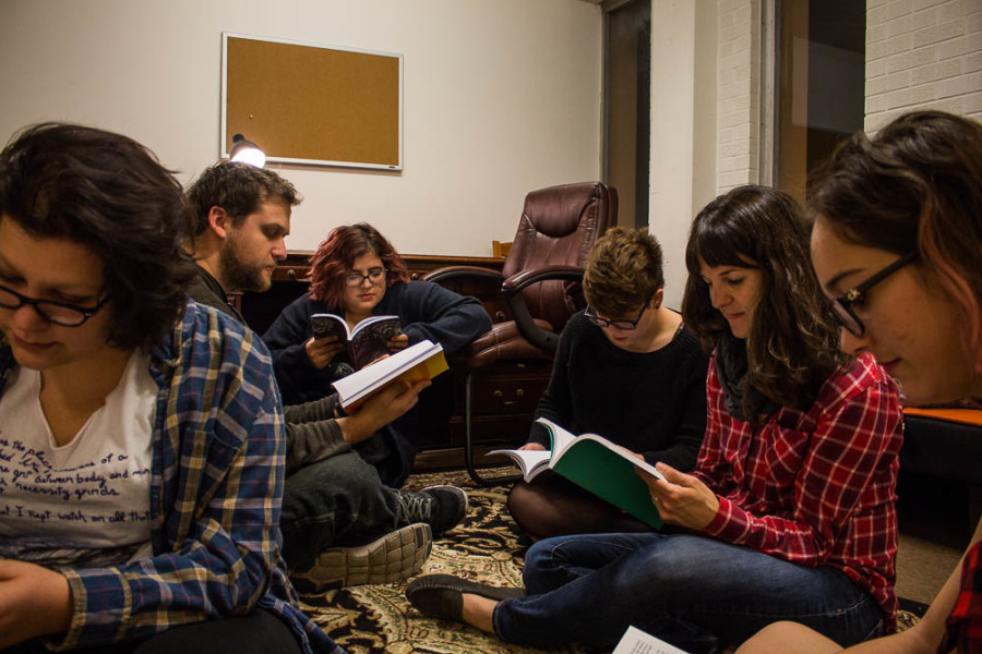 2016 Glyph editorial staff read past issues of Glyph. From left to right: Melinda Freudenberger, Andrew Koss, Amaya Hoke, Brianna Neumann, Anne Valente and Marisa Doherty. Photo by Christy Marshall
