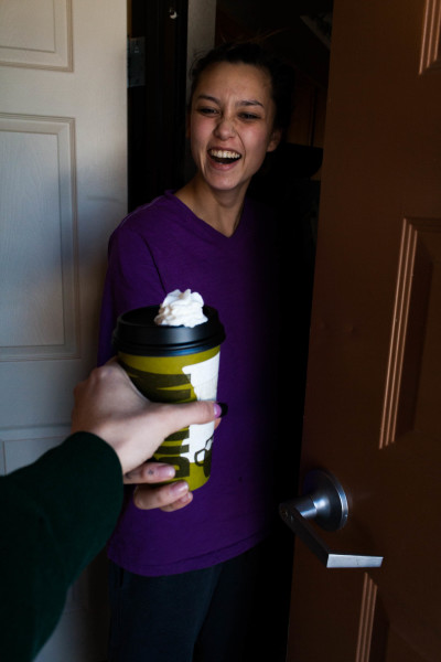 The photographer gives  Partin her coffee that morning, as a thanks. Photo by Whitney Wernick