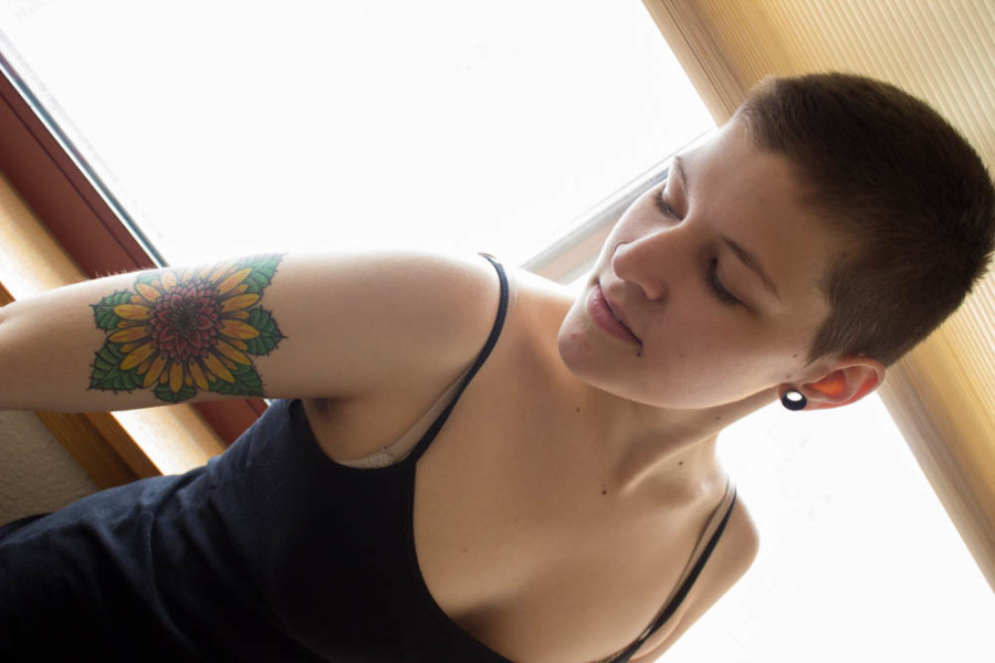 Italia Lannucci’s elaborate sunflower was her first tattoo. Photo by Kyleigh Carter.