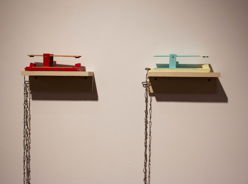 Sculpture by Garret Koch “Childs Toys”. Made with wood, acrylic paint, magnets and solder. Photo by Whitney Wernick