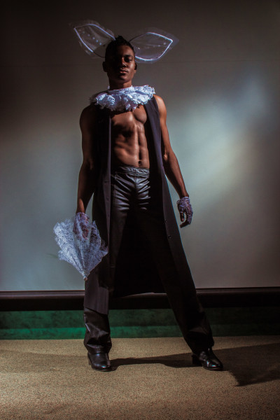 Terrell Armstrong shows the look he walked for the April Showers fashion show. Photo by Marco Rivera