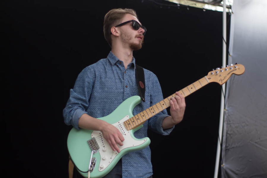 Ardaya’s lead guitar player Dennis Brumback performs at Quadstock. Photo by Jason Stilgebouer.