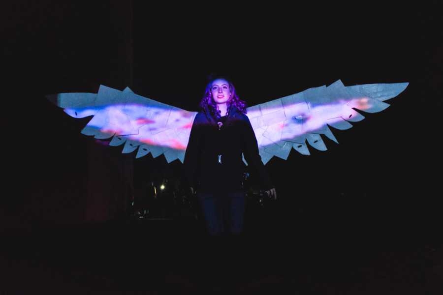 WIngs of light projected on wings of metal creating an interactive installation at OVF. Photo Richard Sweeting