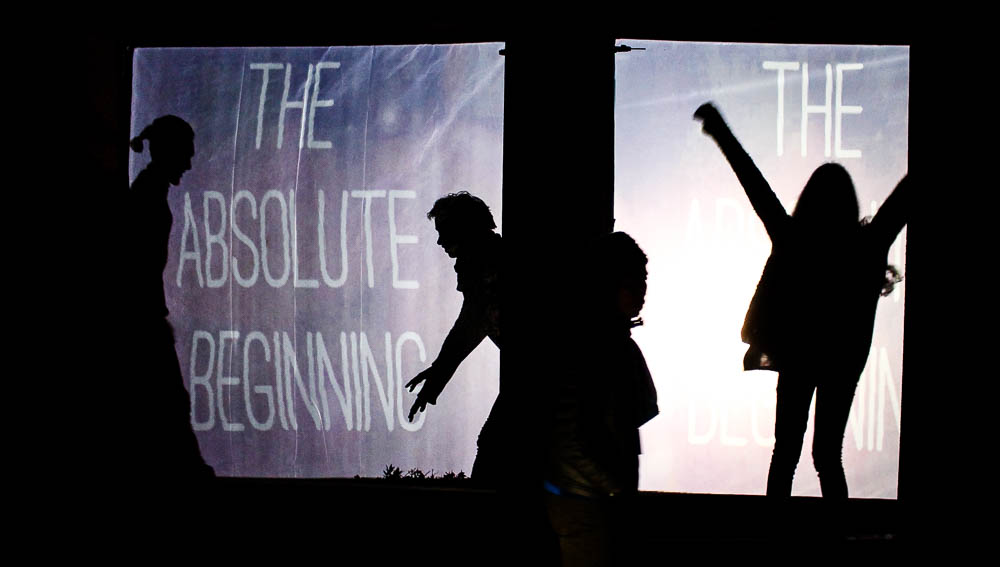 Students have fun with using the projections and their shadows. Photo by Christy Marshall
