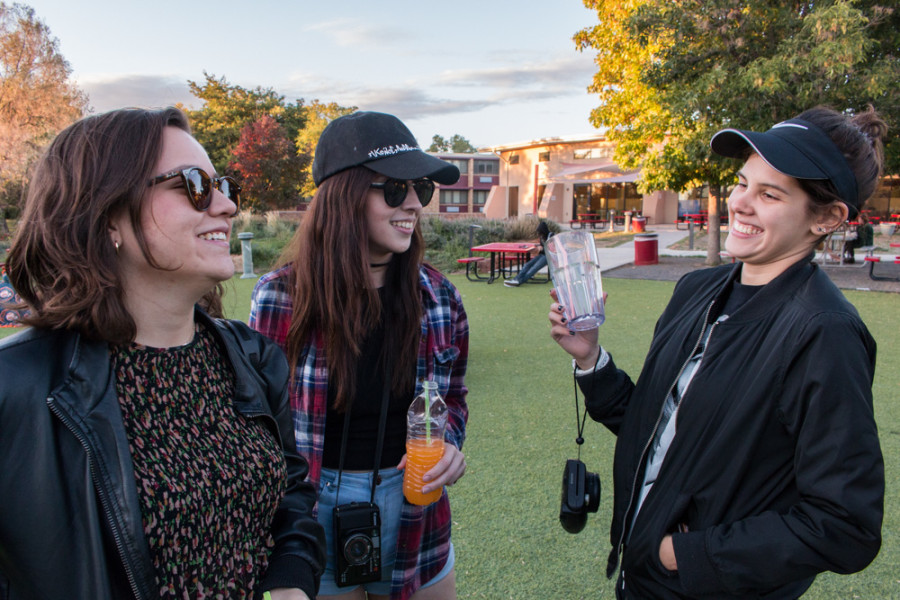 Taking in the music, drinks and laughs from left to right Ana Aguirre, Carolina Long and Alexia Moreno. Photo by Yoana Medrano. 