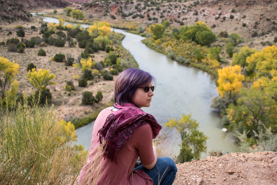 Sophomore Photography Major Willow Howell overlooking the Chama river on the photography department field trip. Photo credit: Chris Dorantes