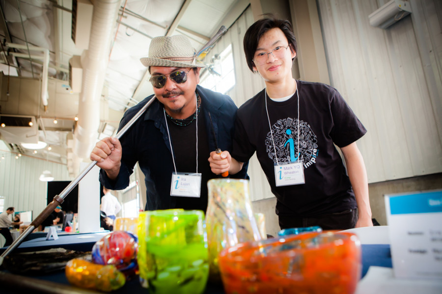 YQ Wheaton and Ira Lujan show off their glassblowing skills. Photo provided by Inspire Santa Fe 